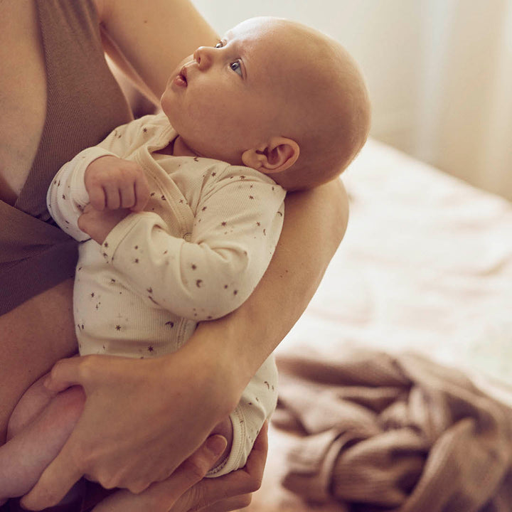 SPARKLE rib body with cross closure